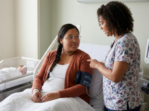 Moving to postpartum room and first checks